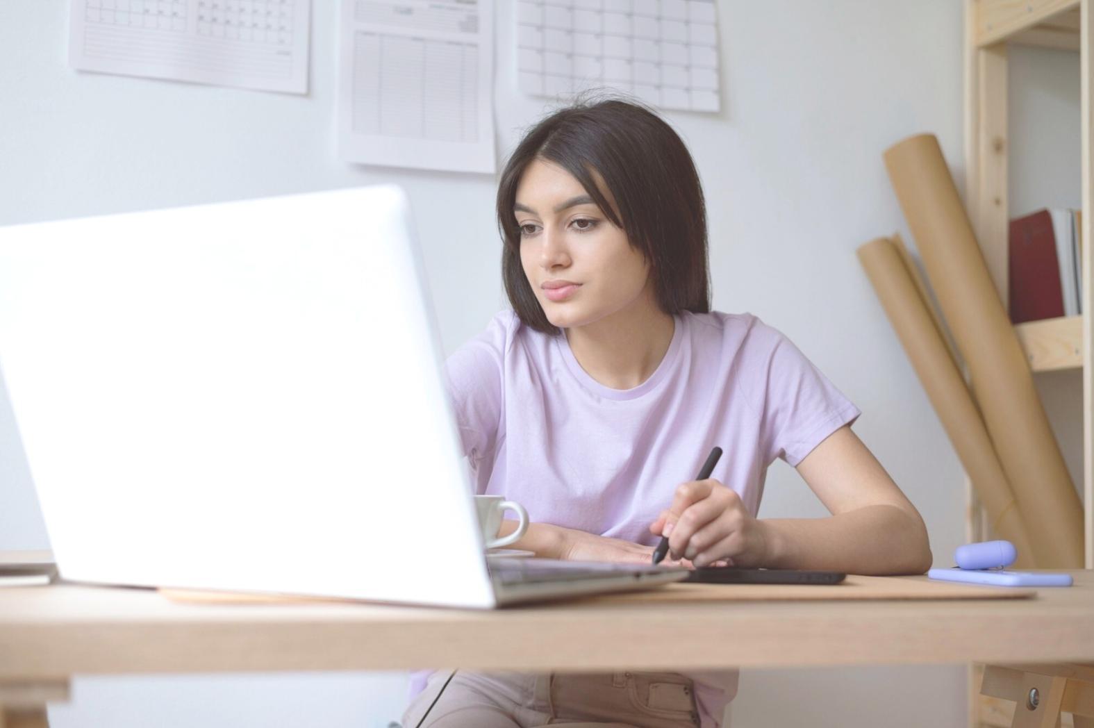 Person reviewing financial documents with organised folders